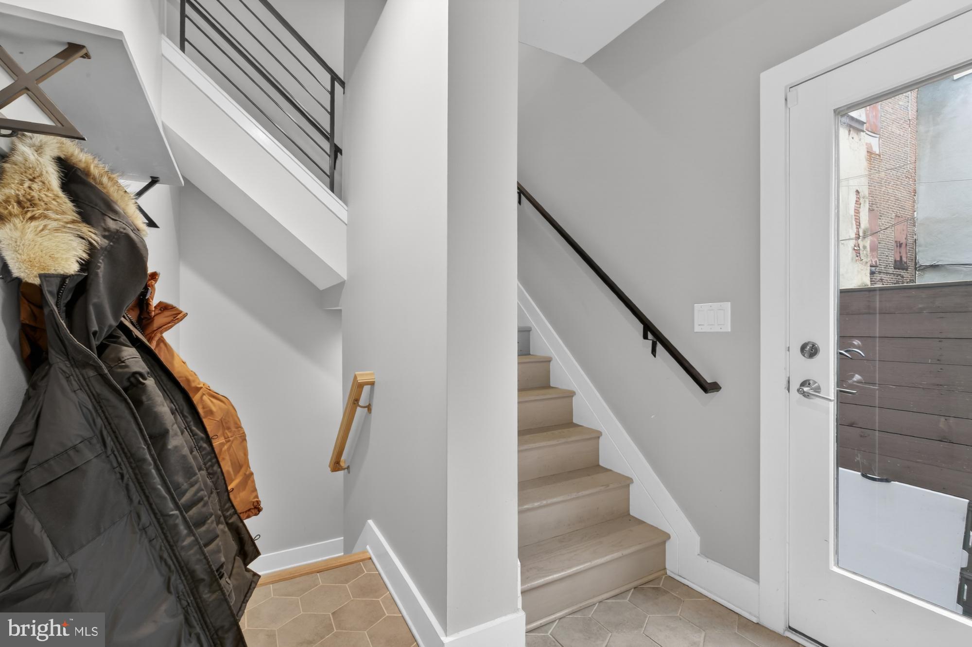151 North 2nd Street, Unit 5 Philadelphia, PA 19106 - Photo 31 of 35 a view of staircase with wooden floor and chair
