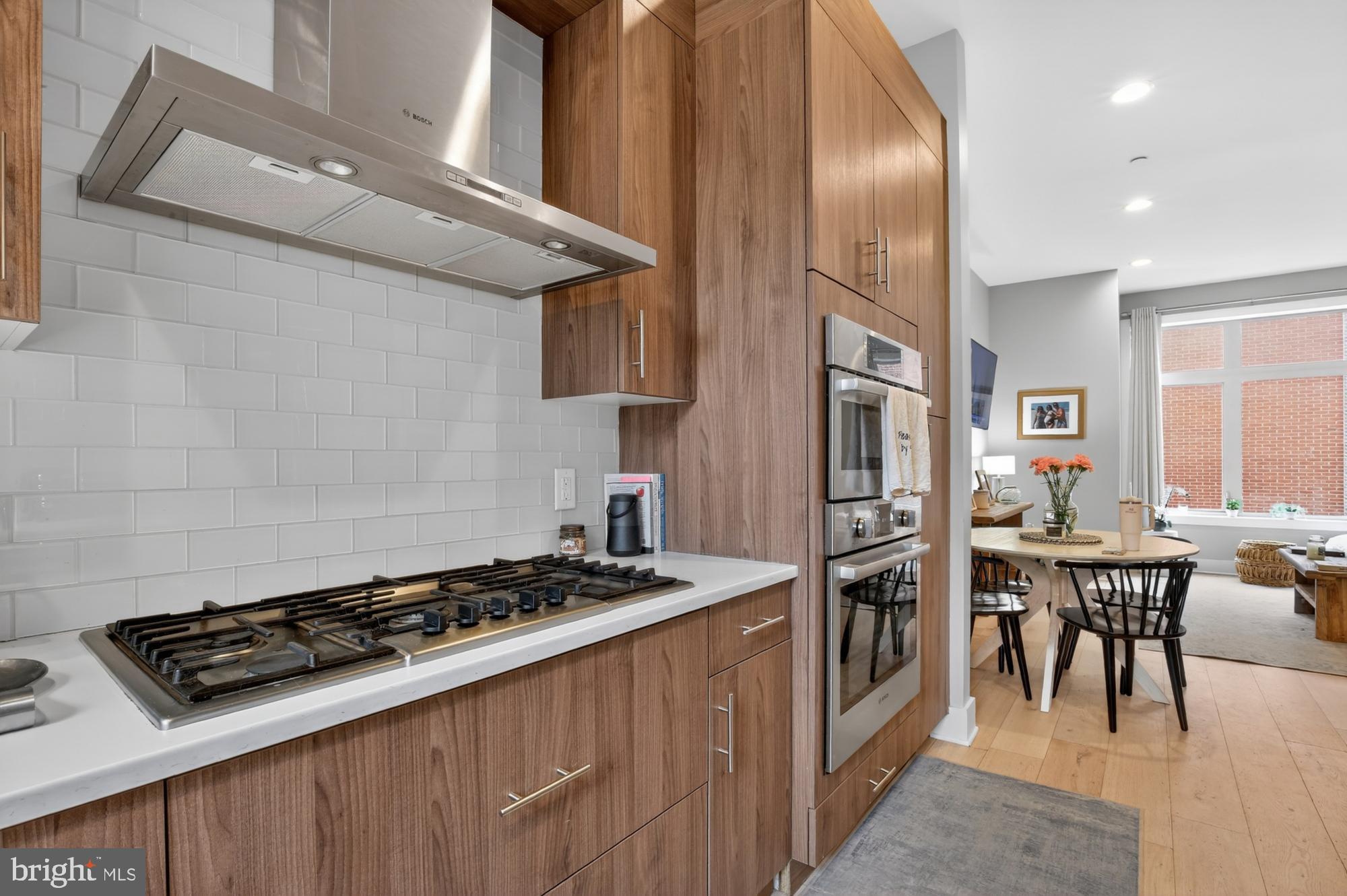 151 North 2nd Street, Unit 5 Philadelphia, PA 19106 - Photo 8 of 35 a kitchen with stainless steel appliances a stove a sink dishwasher and cabinets