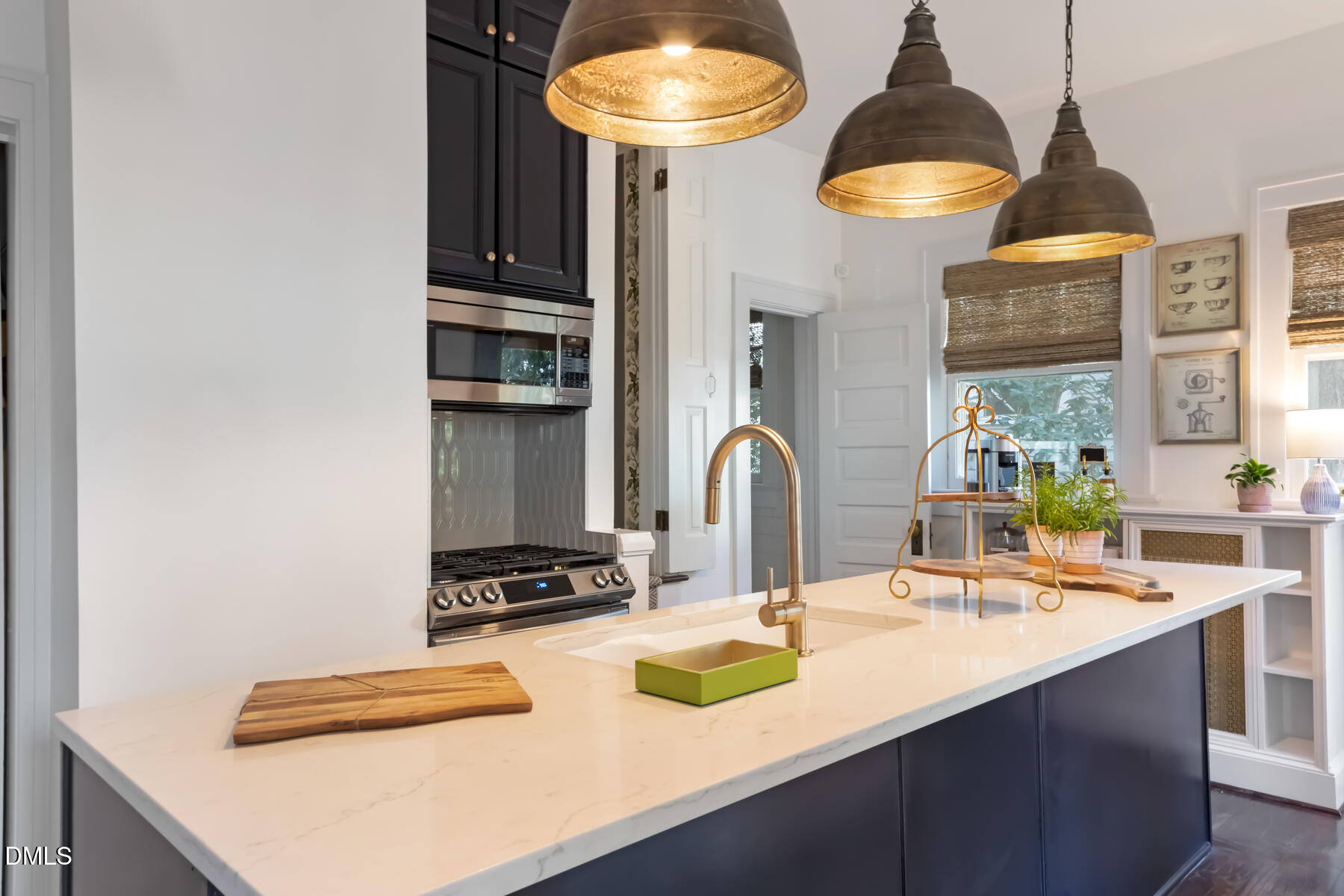 116 Hillcrest Road Raleigh, NC 27605 - Photo 11 of 34 a kitchen with a sink and a stove