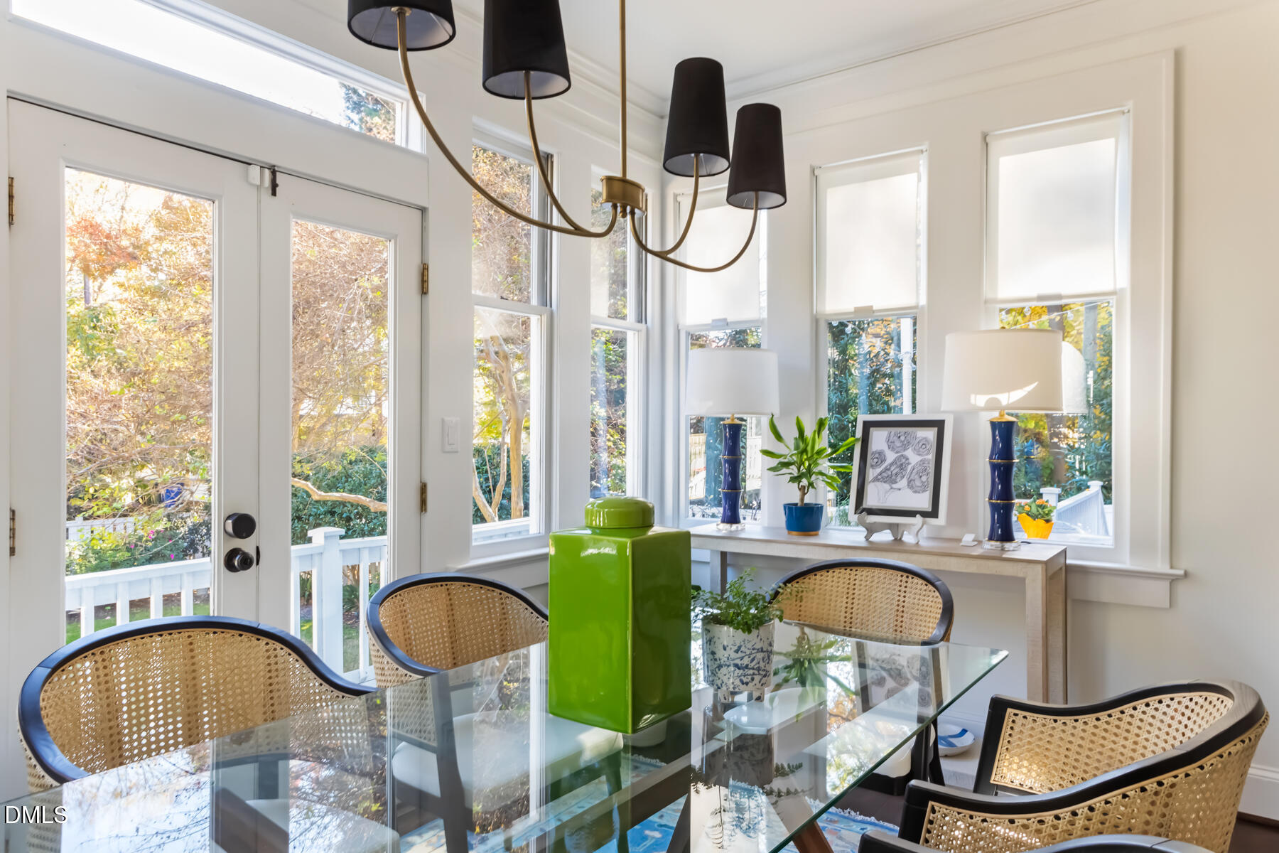 116 Hillcrest Road Raleigh, NC 27605 - Photo 15 of 34 a dining room with furniture a chandelier and wooden floor