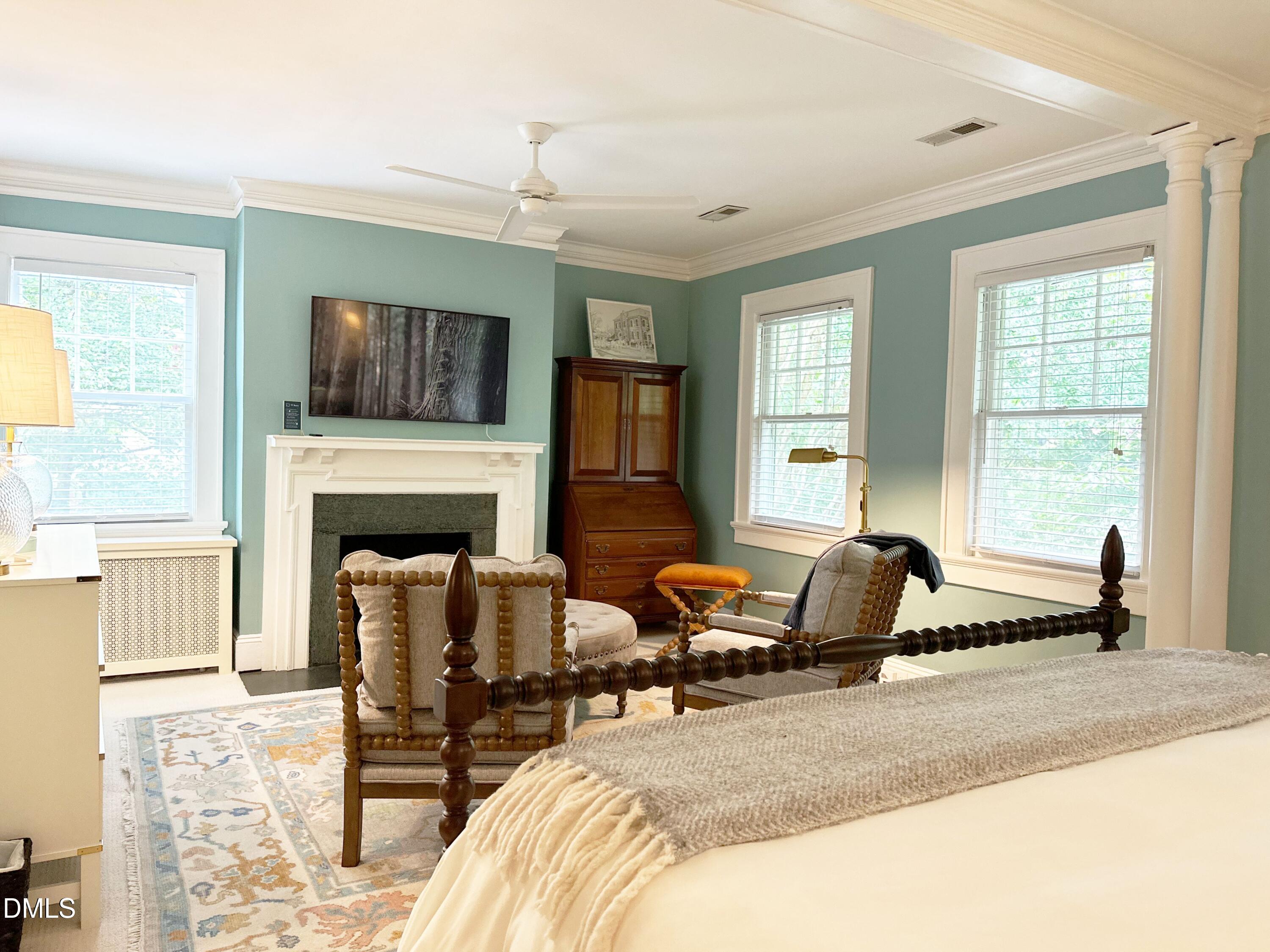 116 Hillcrest Road Raleigh, NC 27605 - Photo 17 of 34 a living room with furniture fireplace and window