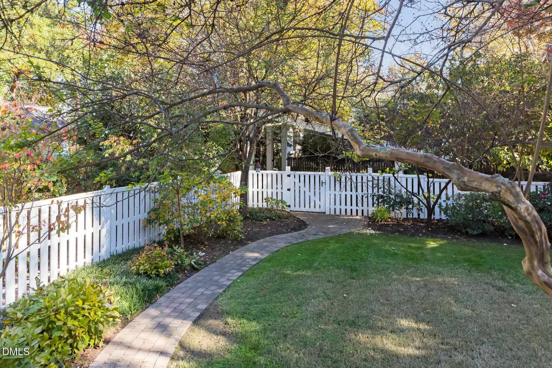 116 Hillcrest Road Raleigh, NC 27605 - Photo 29 of 34 a view of a yard with wooden fence