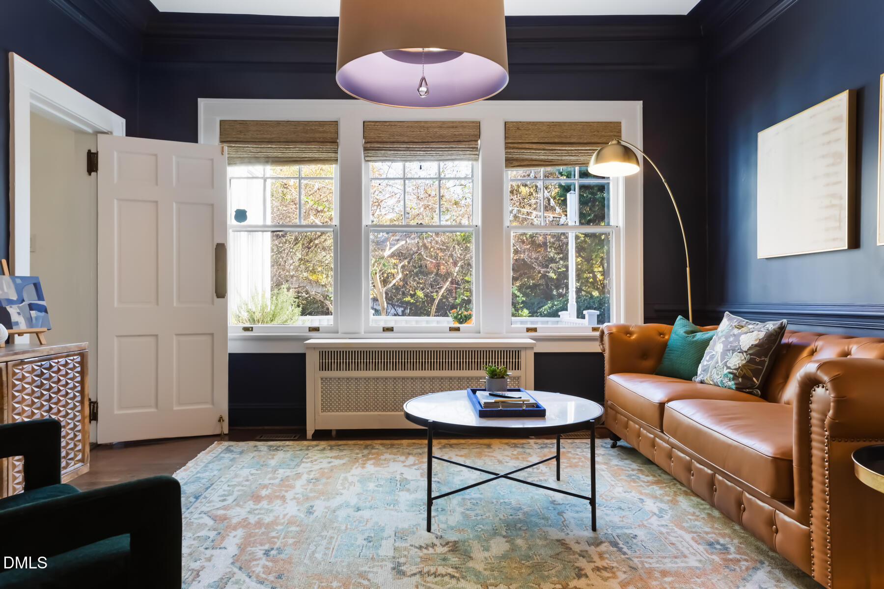 116 Hillcrest Road Raleigh, NC 27605 - Photo 5 of 34 a living room with furniture and a large window