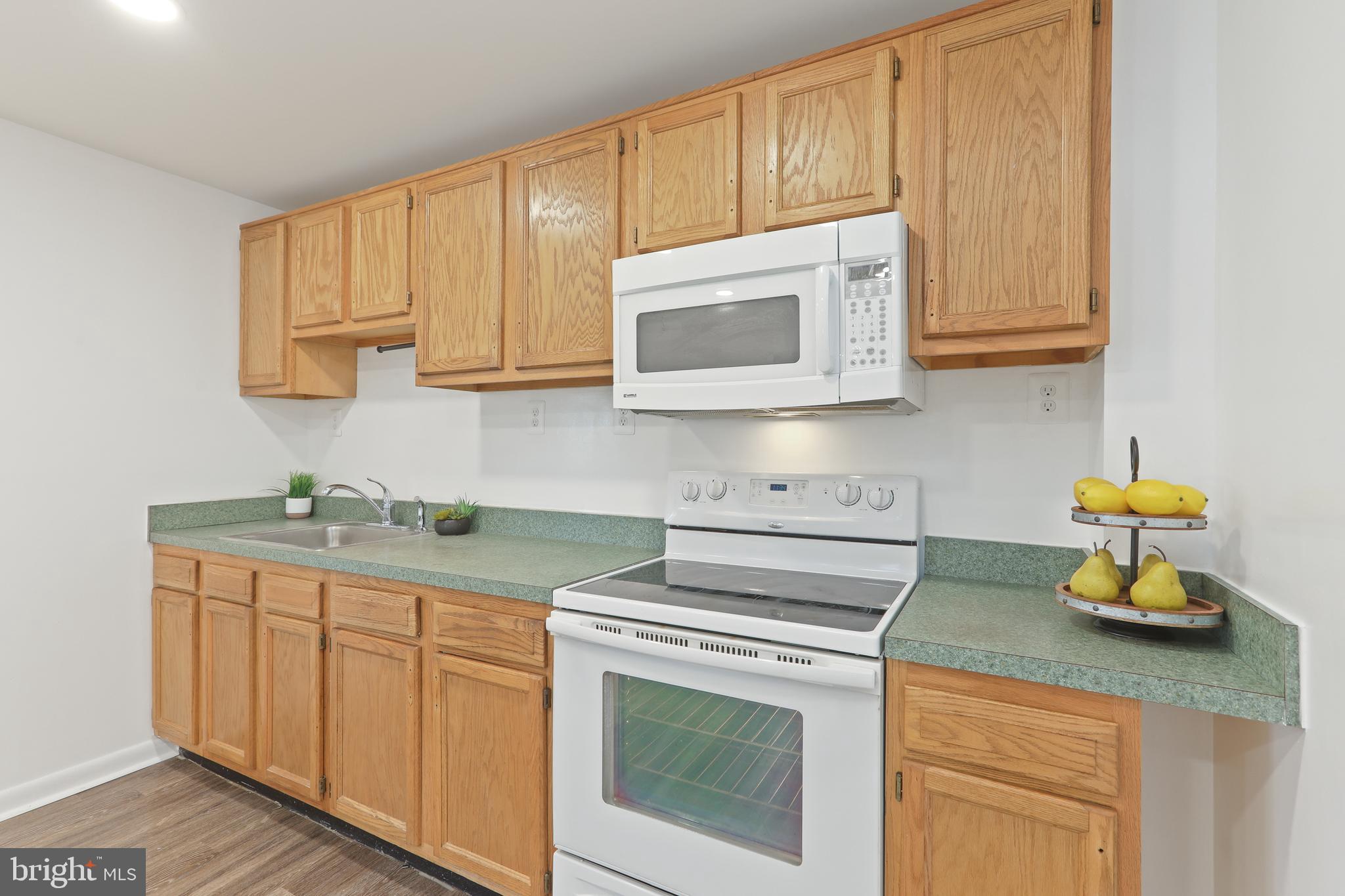 7823 Denton Avenue, Unit 5 Sparrows Point, MD 21219 - Photo 15 of 43 Kitchen with Electric oven + microwave