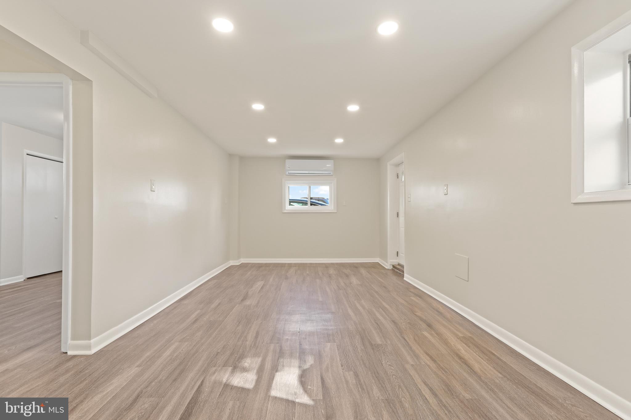 7823 Denton Avenue, Unit 5 Sparrows Point, MD 21219 - Photo 19 of 43 Living Room 19'x 14' with New Luxury Vinyl Plank F