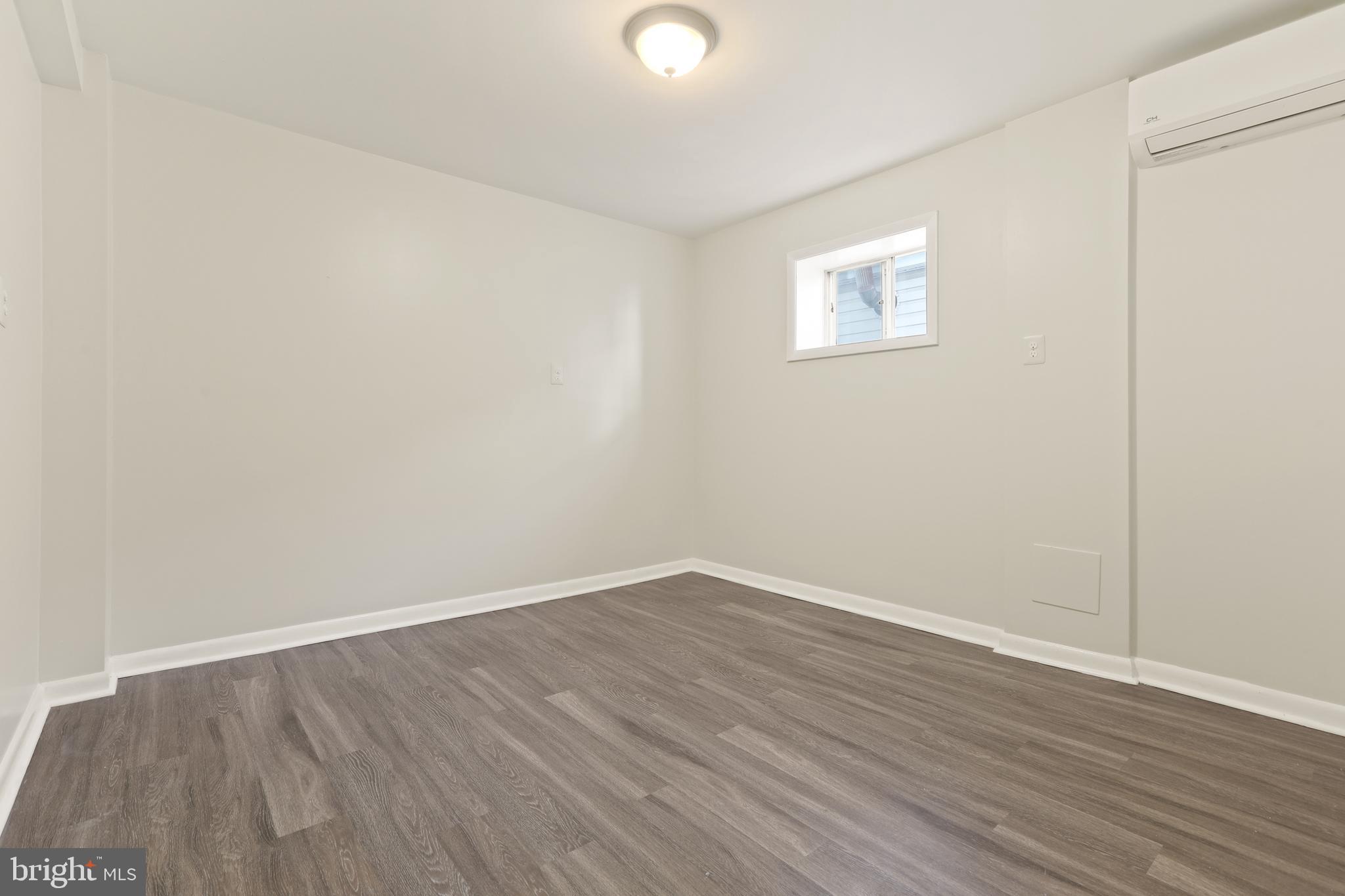 7823 Denton Avenue, Unit 5 Sparrows Point, MD 21219 - Photo 20 of 43 Bedroom #1; 14'x10'
with New Luxury Vinyl Plank F