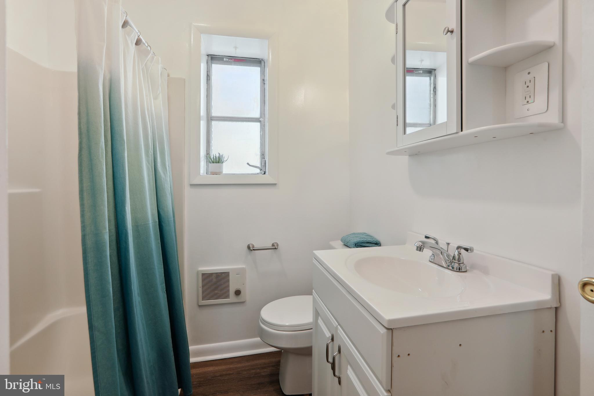 7823 Denton Avenue, Unit 5 Sparrows Point, MD 21219 - Photo 24 of 43 Full Bathroom Tub/Shower with Vanity Storage