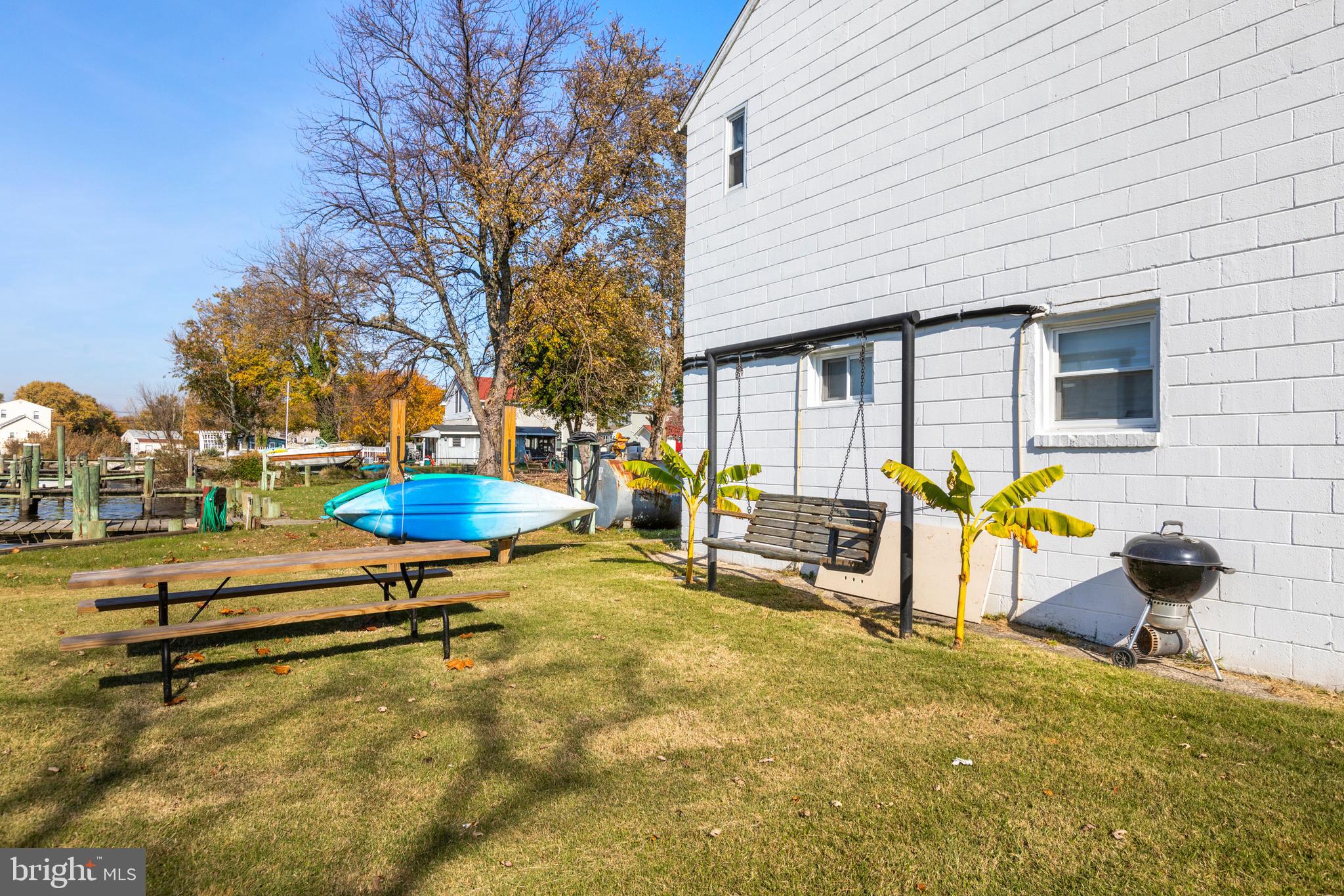 7823 Denton Avenue, Unit 5 Sparrows Point, MD 21219 - Photo 7 of 43 Communal Space, Picnic Table, BBQ, Kayak Storage