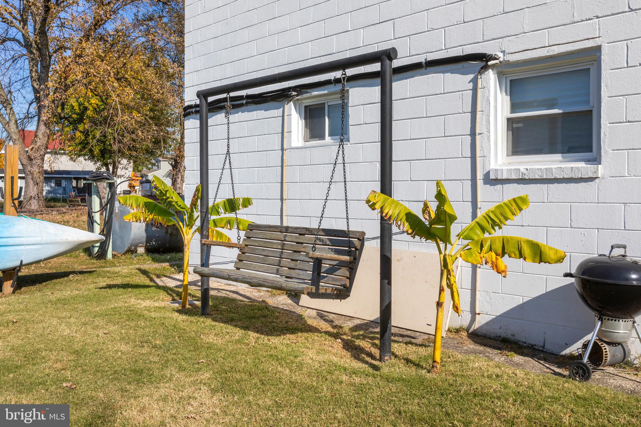 7823 Denton Avenue, Unit 5 Sparrows Point, MD 21219 - Photo 8 of 43 Common Area Swinging Bench - Outdoor Living Space