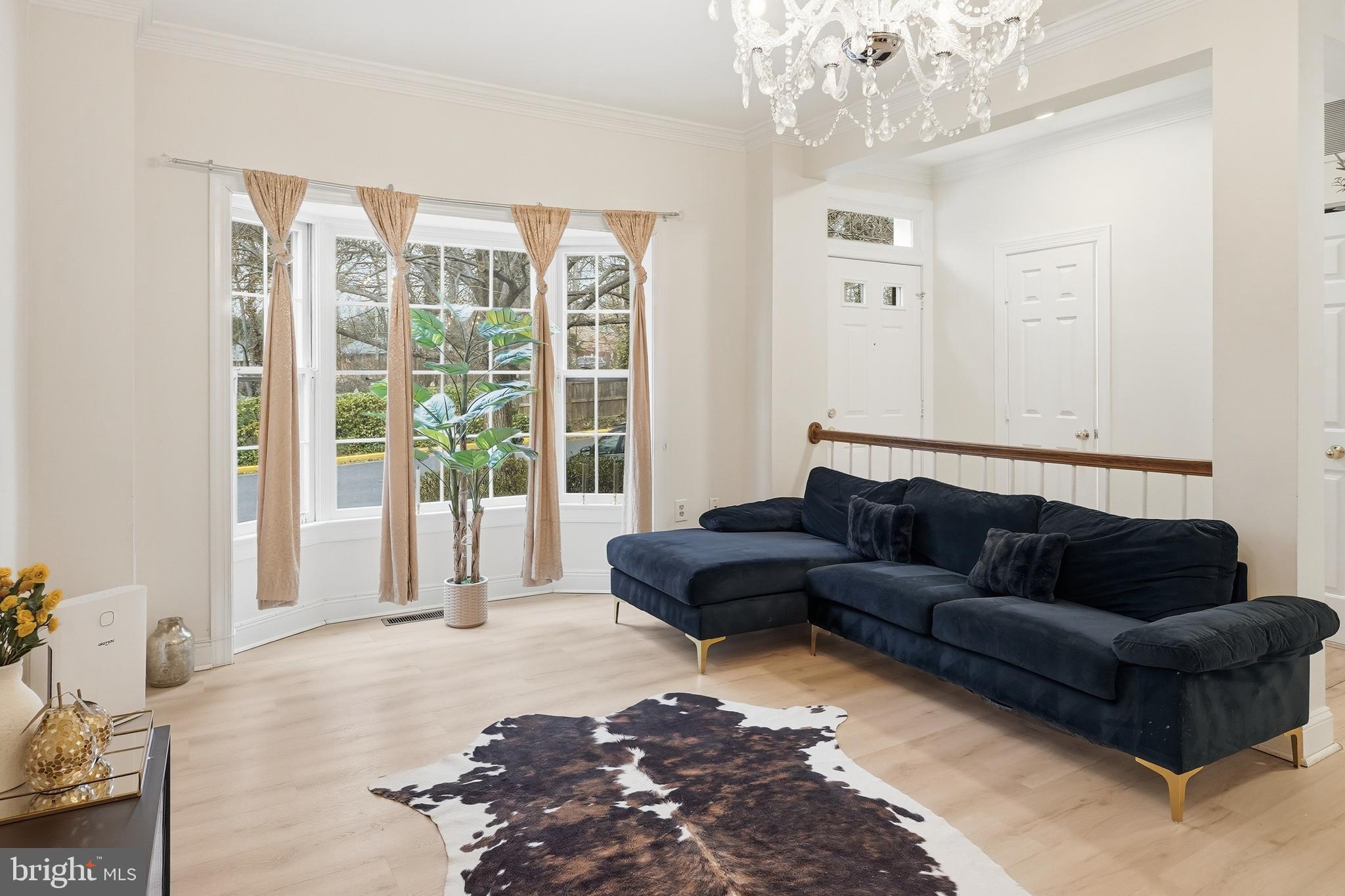 6524 Milva Lane Springfield, VA 22150 - Photo 13 of 47 a living room with furniture and a large window