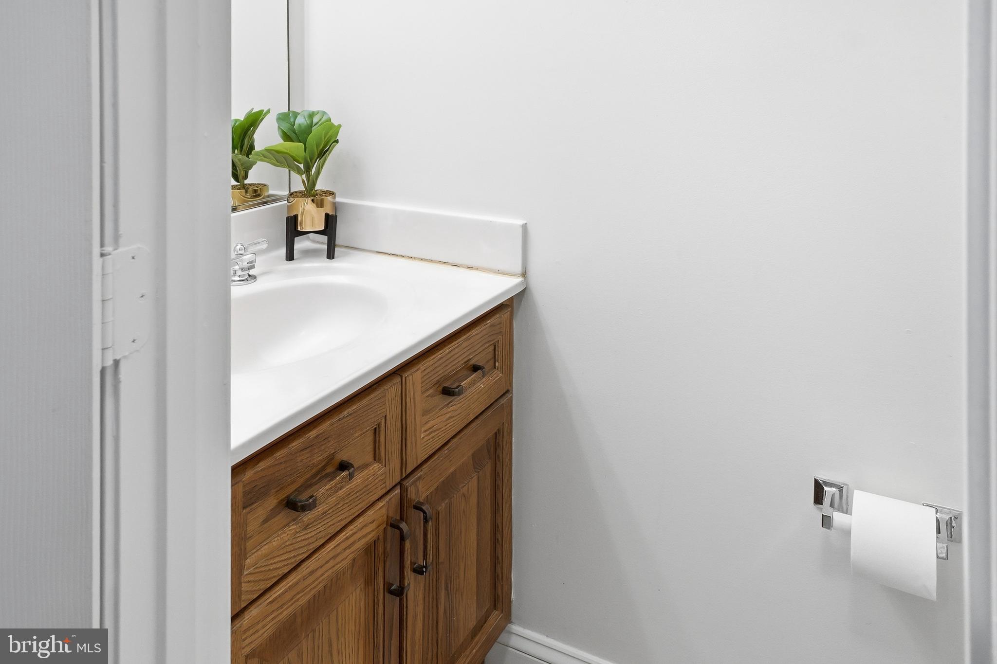 6524 Milva Lane Springfield, VA 22150 - Photo 20 of 47 a room with cabinets and wooden floor