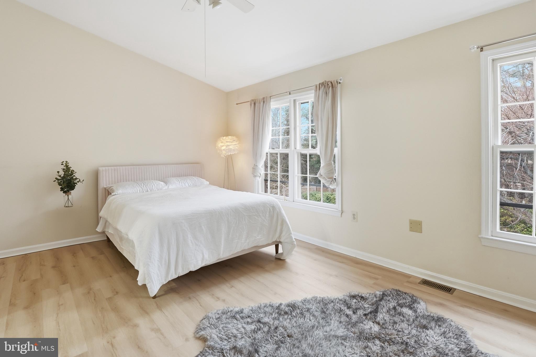 6524 Milva Lane Springfield, VA 22150 - Photo 30 of 47 a bedroom with a bed and a window