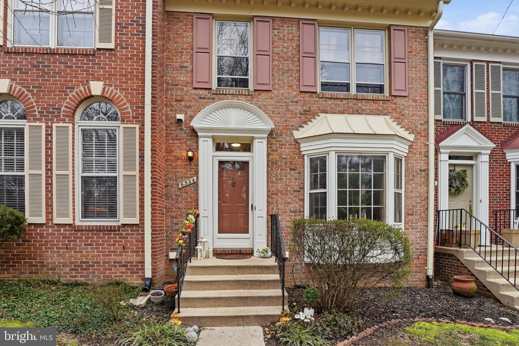 6524 Milva Lane Springfield, VA 22150 - Photo 3 of 47 a front view of a house with a yard