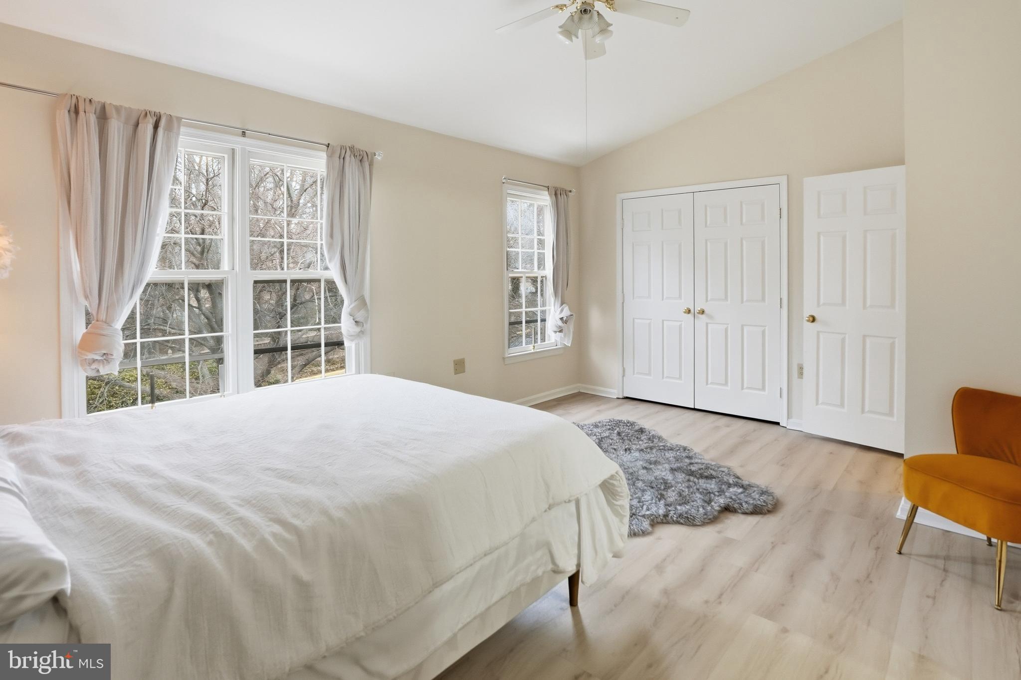 6524 Milva Lane Springfield, VA 22150 - Photo 33 of 47 a bedroom with a bed and a chair with the outer view