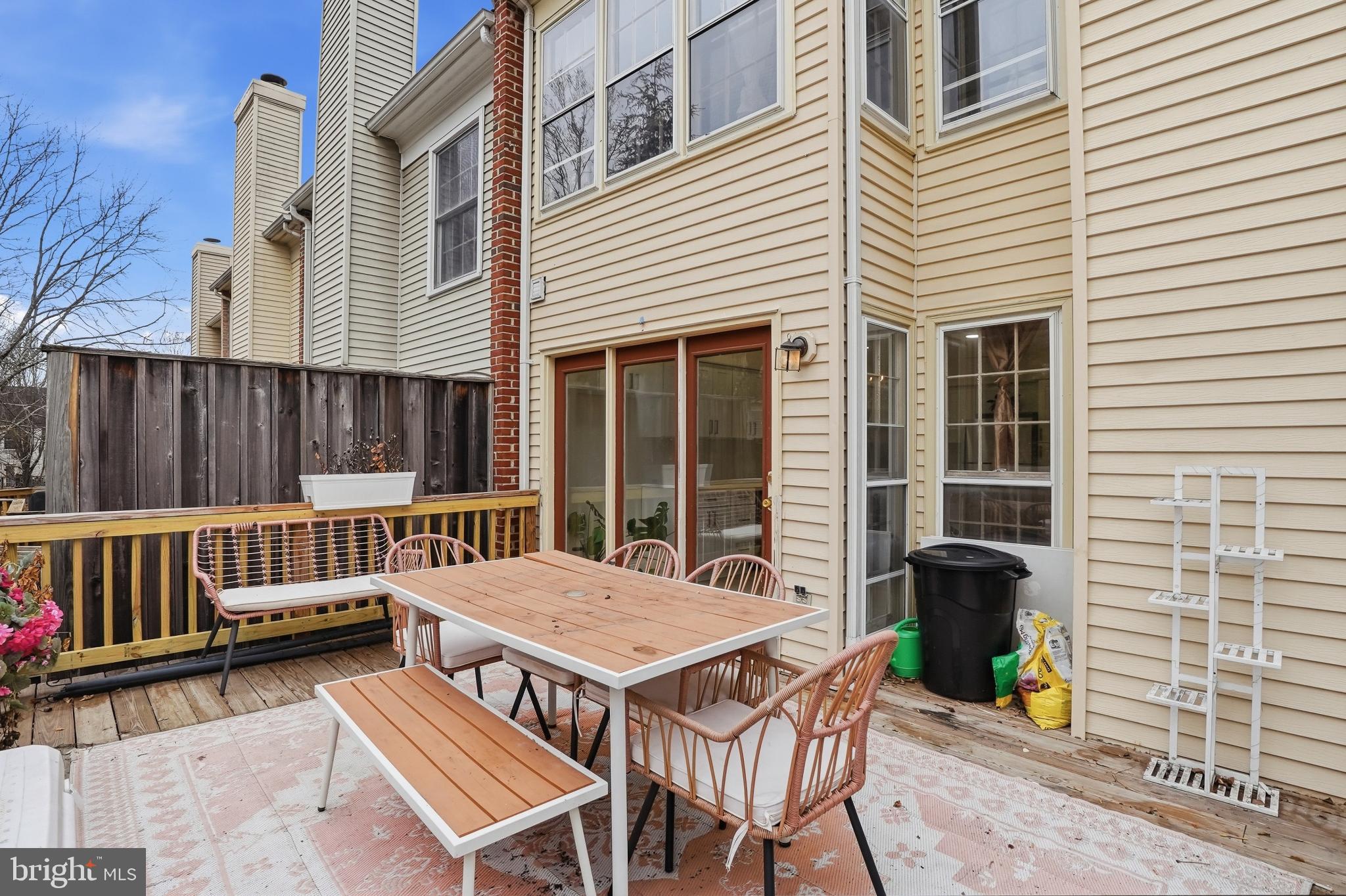6524 Milva Lane Springfield, VA 22150 - Photo 41 of 47 a view of a patio with a table and chairs