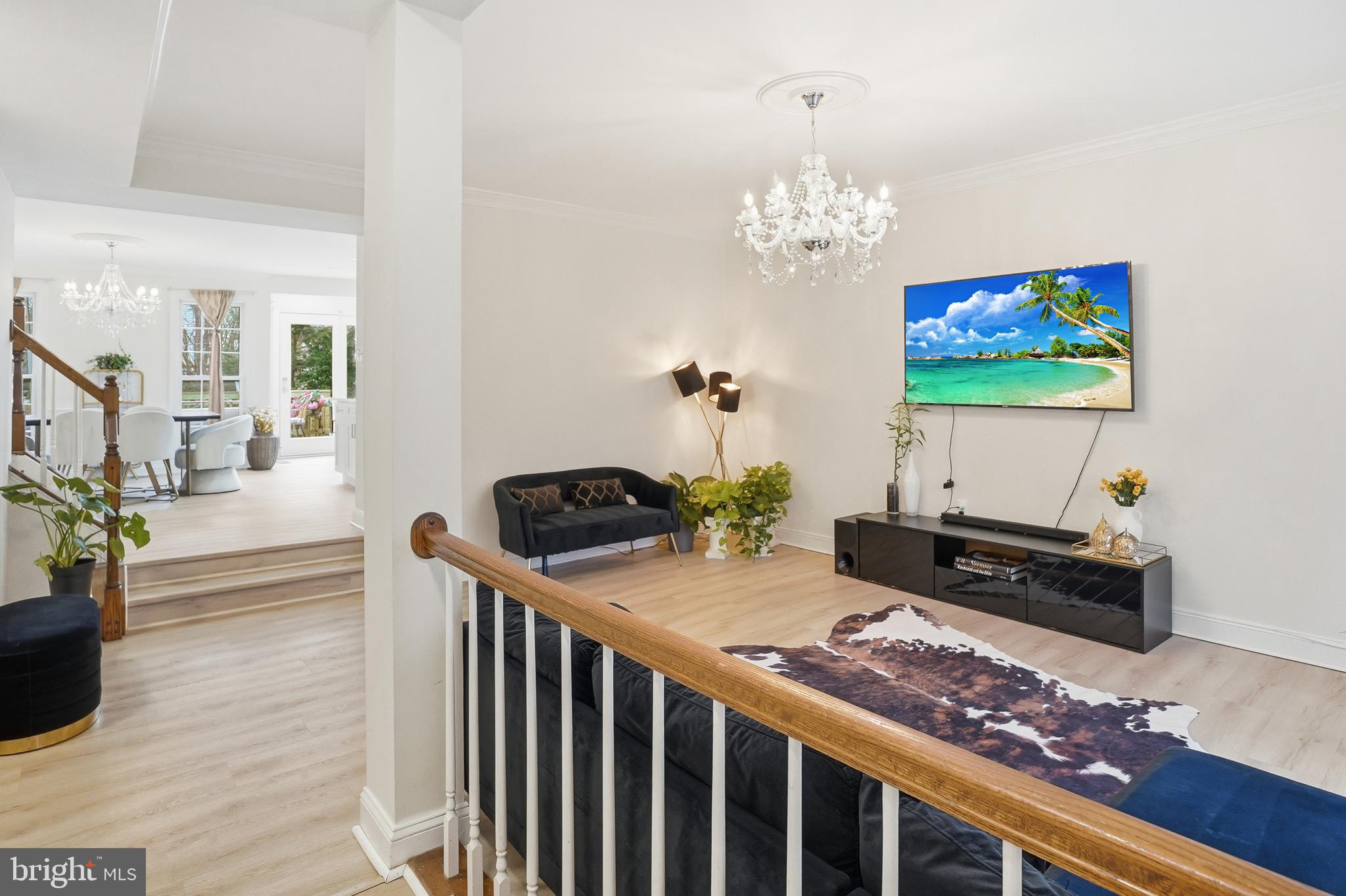 6524 Milva Lane Springfield, VA 22150 - Photo 7 of 47 a living room with furniture and a chandelier