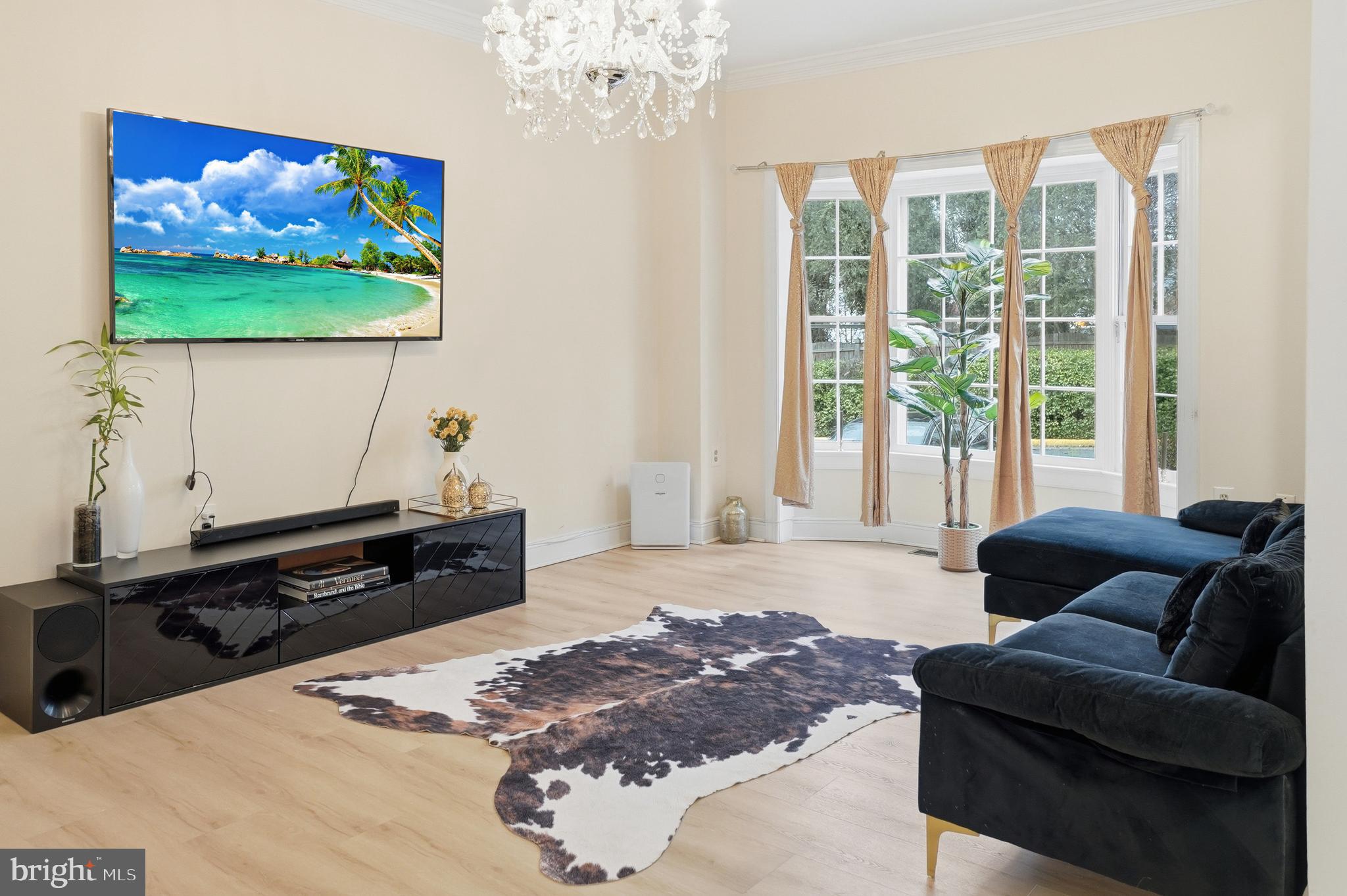 6524 Milva Lane Springfield, VA 22150 - Photo 9 of 47 a living room with furniture and a flat screen tv