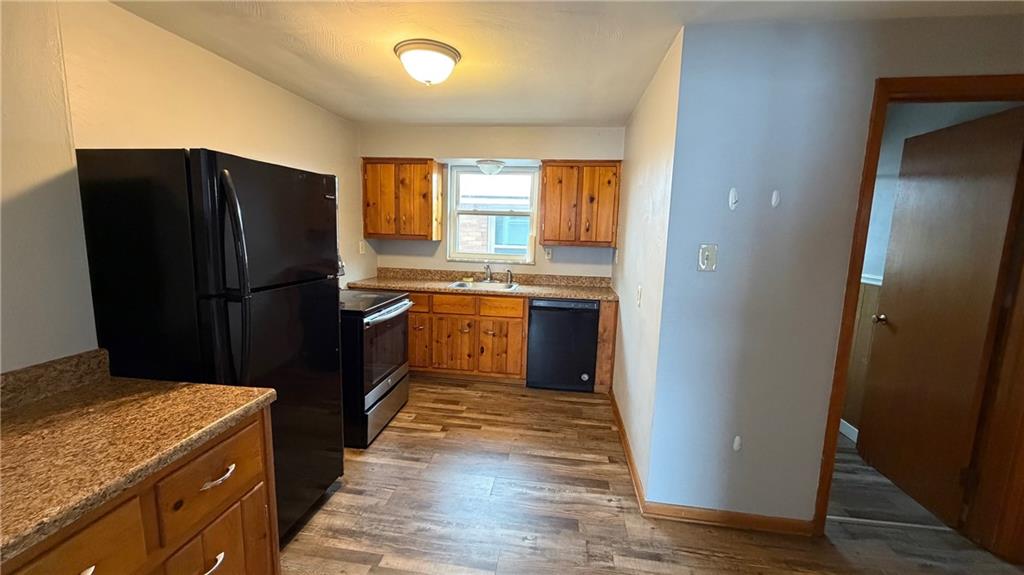 22 Adrian Avenue, Unit 2 Pittsburgh, PA 15229 - Photo 2 of 14 a kitchen with a refrigerator and a sink