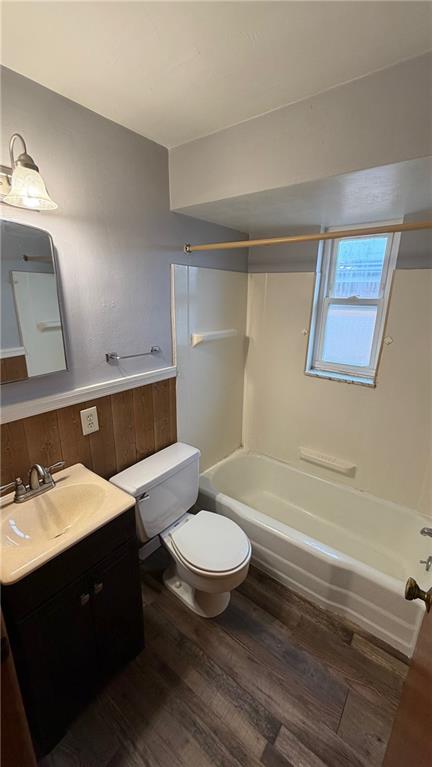 22 Adrian Avenue, Unit 2 Pittsburgh, PA 15229 - Photo 9 of 14 a bathroom with a sink a toilet a mirror and shower