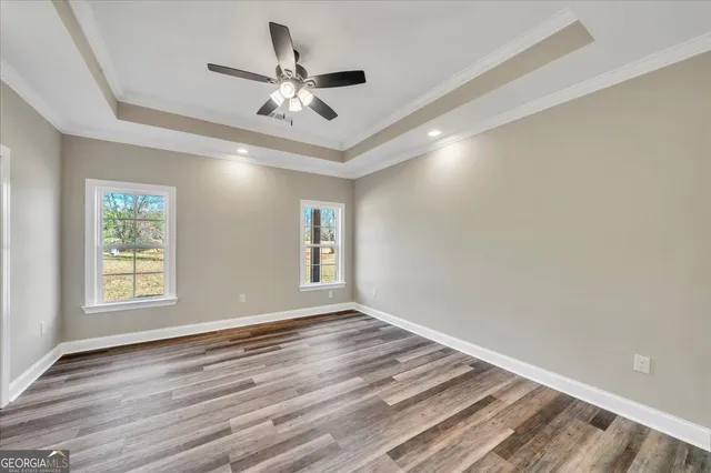 a bathroom with a granite countertop sink