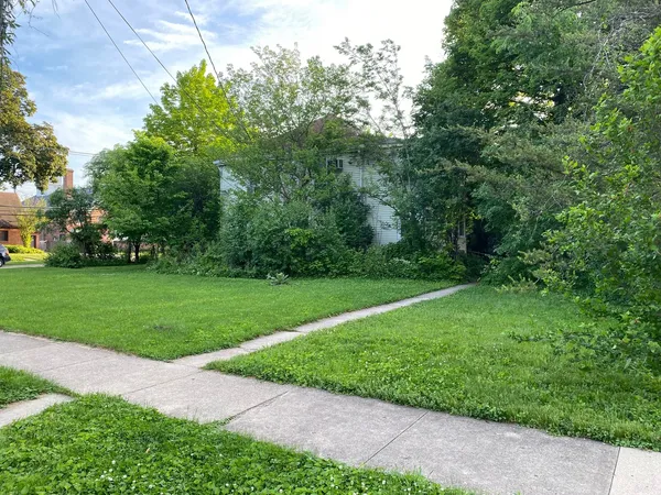 a house view with a garden space