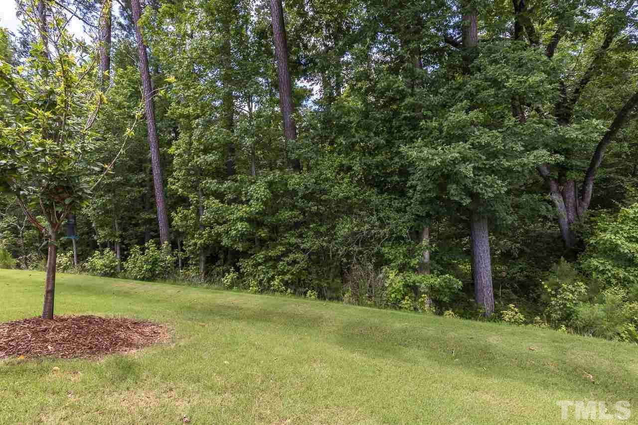 613 Tuttle Road Durham, NC 27703 - Photo 23 of 30 Notice the large shade trees that bring relief from the sun in the early afternoon - the reason behind the $30,000 lot upgrade!