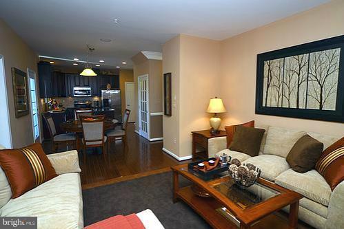 7332 Windsor Mill Road Baltimore, MD 21244 - Photo 2 of 19 a living room with furniture and a large window