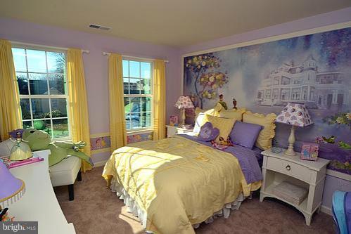 7332 Windsor Mill Road Baltimore, MD 21244 - Photo 13 of 19 a bedroom with bed and window
