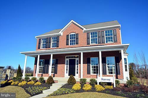 7332 Windsor Mill Road Baltimore, MD 21244 - Photo 19 of 19 front view of a house with a yard