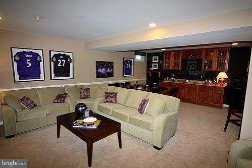 7332 Windsor Mill Road Baltimore, MD 21244 - Photo 4 of 19 a living room with furniture and painting on the wall