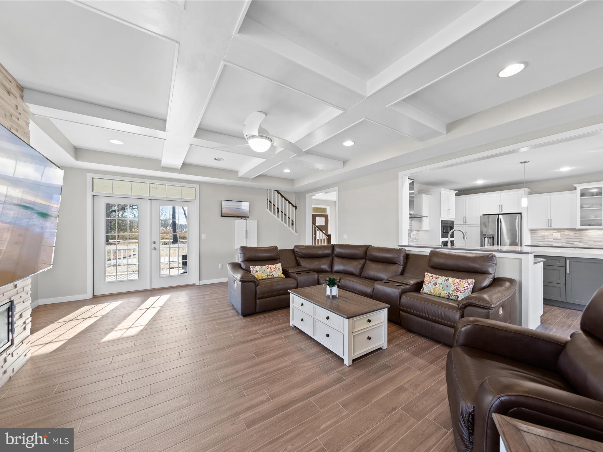8475 New Hope Road Willards, MD 21874 - Photo 16 of 50 a living room with furniture and a wooden floor