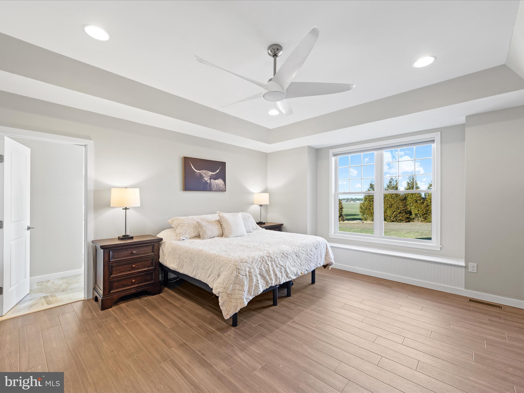 8475 New Hope Road Willards, MD 21874 - Photo 20 of 50 a bedroom with a large bed and a window