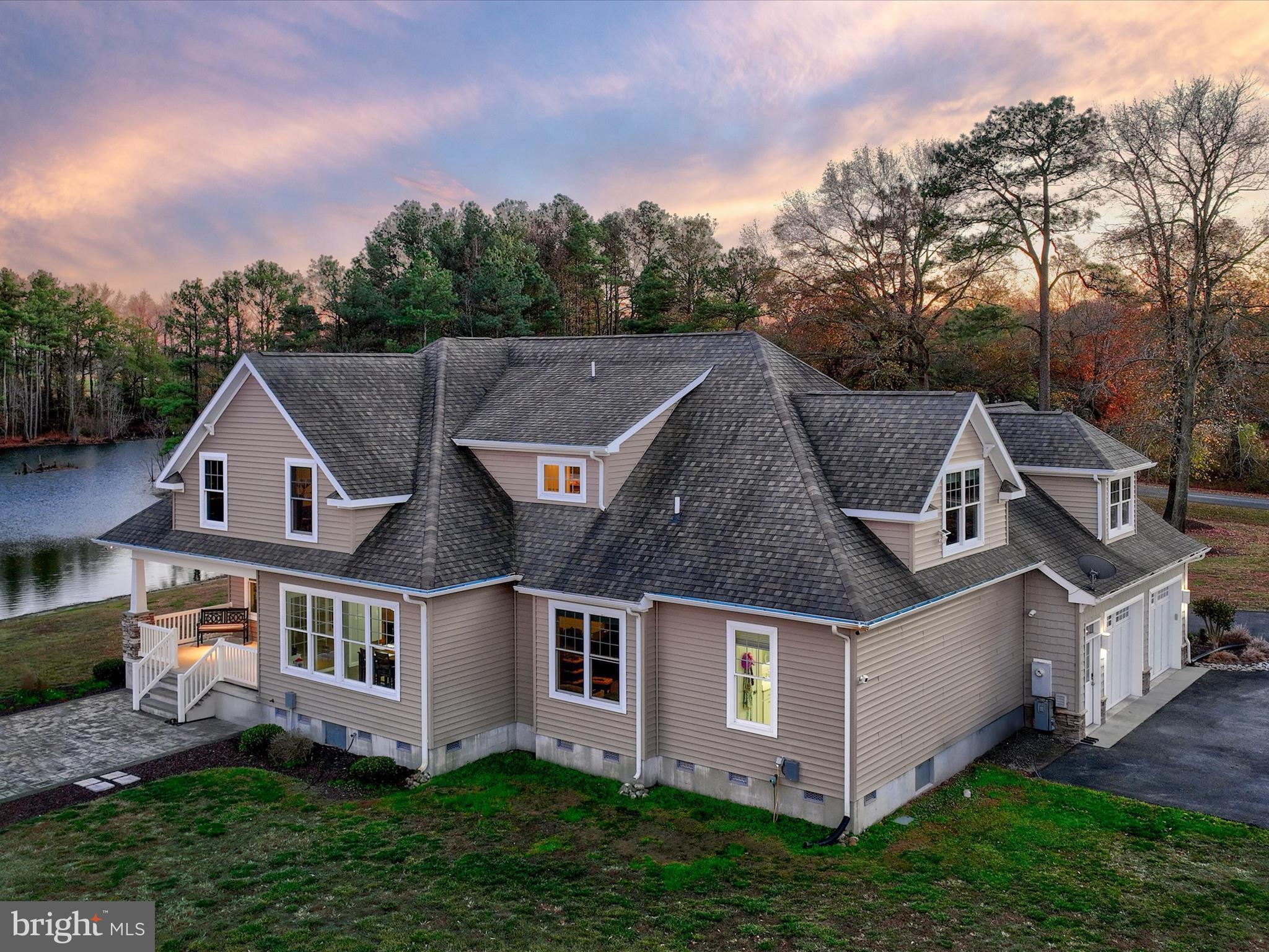 8475 New Hope Road Willards, MD 21874 - Photo 4 of 50 front view of a house with a yard