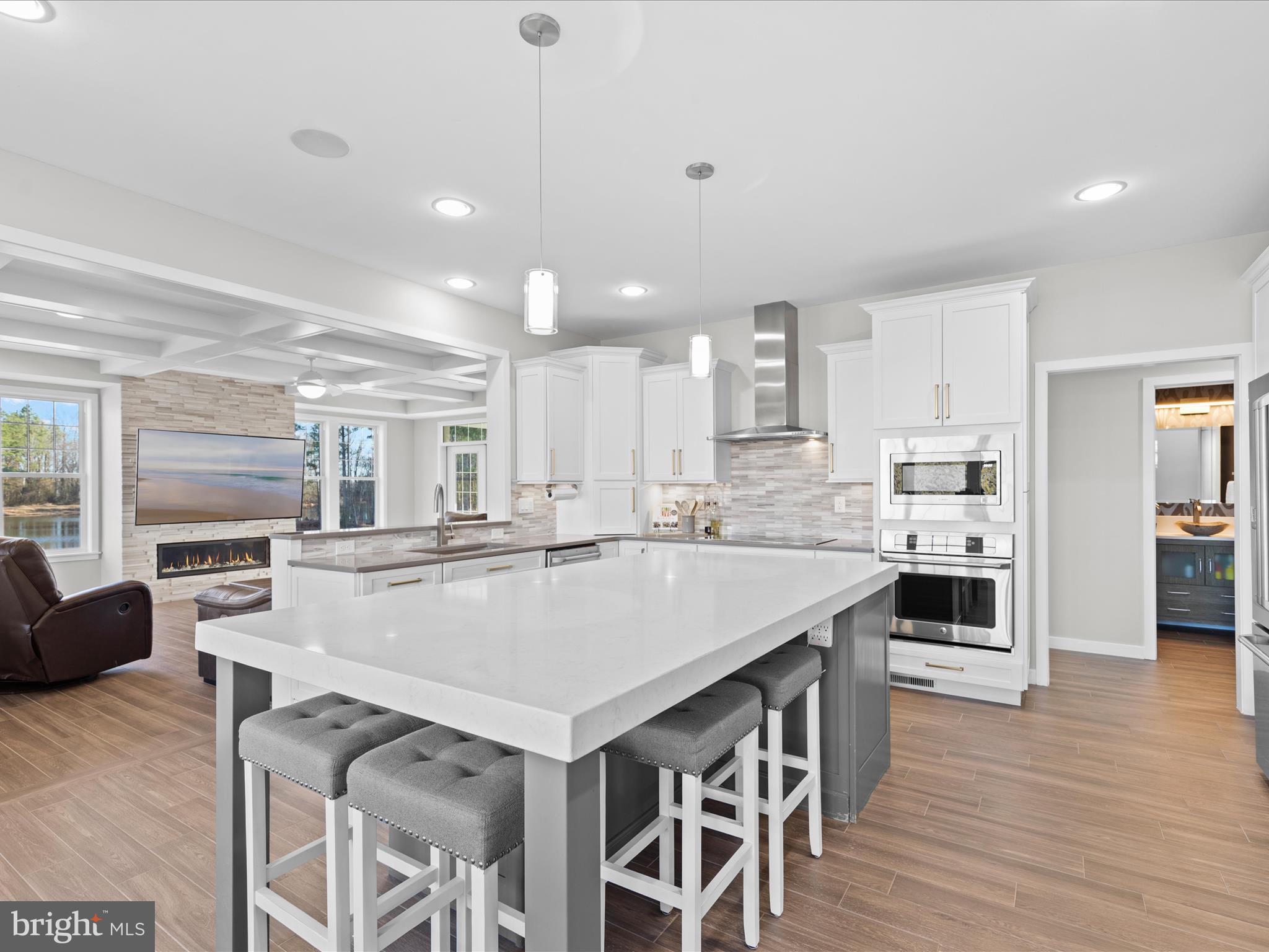 8475 New Hope Road Willards, MD 21874 - Photo 8 of 50 a large kitchen with kitchen island a large island in it