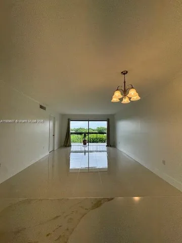 a view of a livingroom with a window