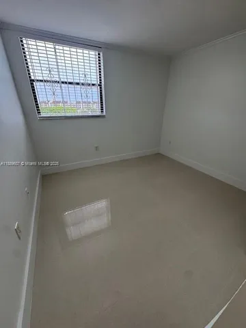 an empty room with a window
