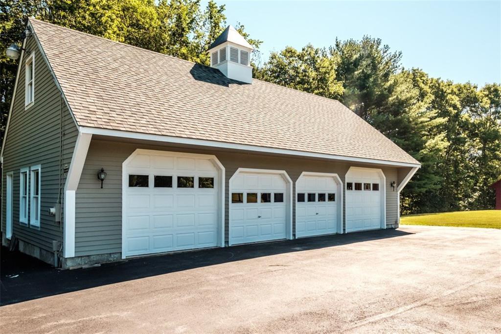 87 Nash Road Windham, ME 04062 - Photo 29 of 35 Heated 4 car garage with storage above