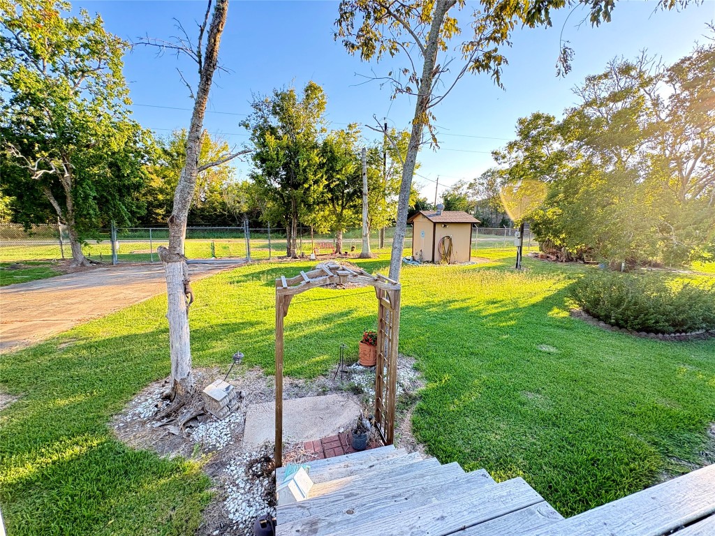 182 Smith Road Palacios, TX 77465 - Photo 24 of 26 a view of a backyard with swimming pool