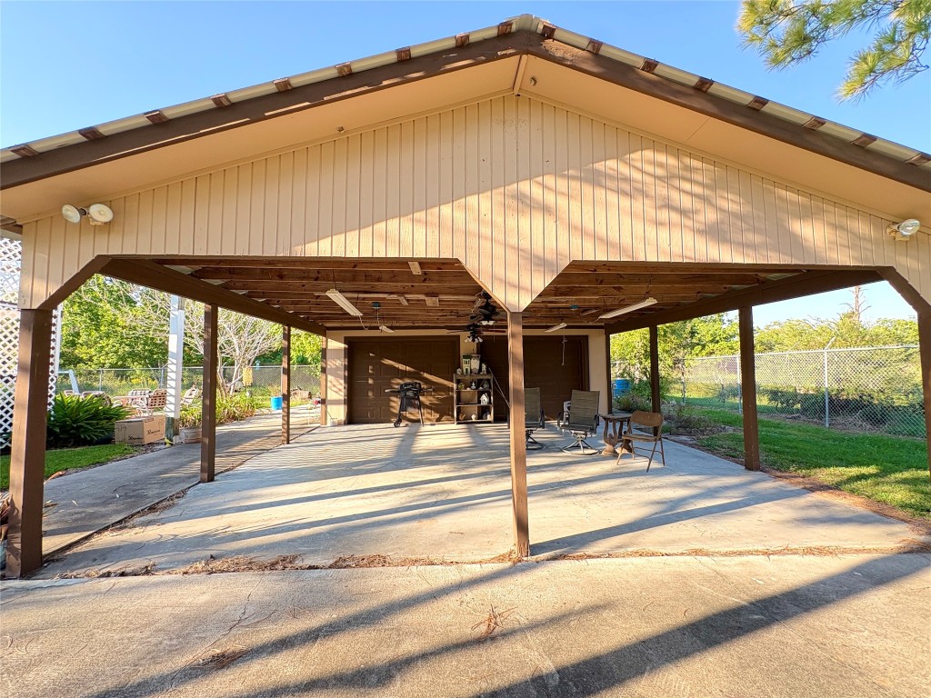 182 Smith Road Palacios, TX 77465 - Photo 3 of 26 a view of a building with a backyard
