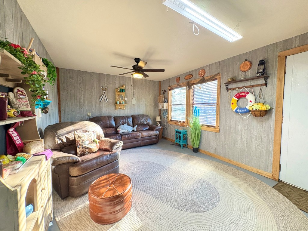 182 Smith Road Palacios, TX 77465 - Photo 7 of 26 a living room with furniture and a window