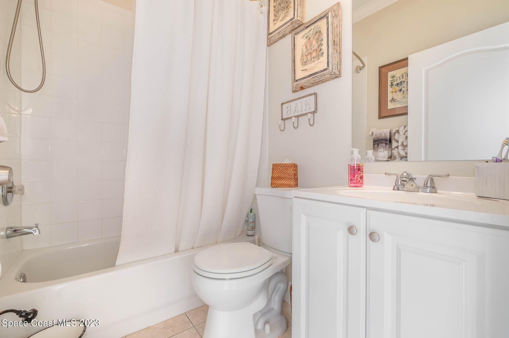 3032 Jacobaeus Lane Indialantic, FL 32903 - Photo 16 of 43 a bathroom with a sink a toilet and shower