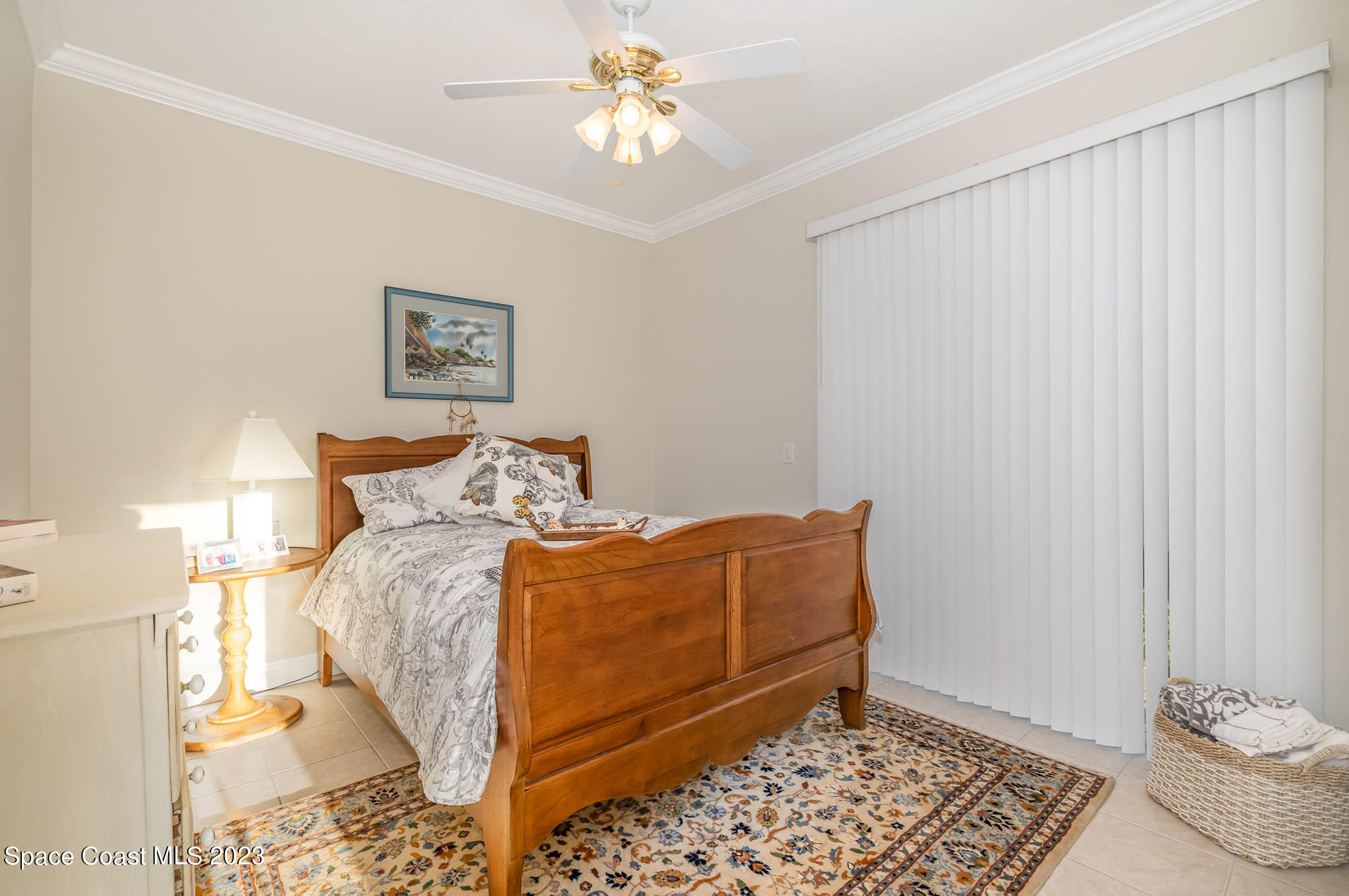 3032 Jacobaeus Lane Indialantic, FL 32903 - Photo 17 of 43 a bed room with a bed and a window
