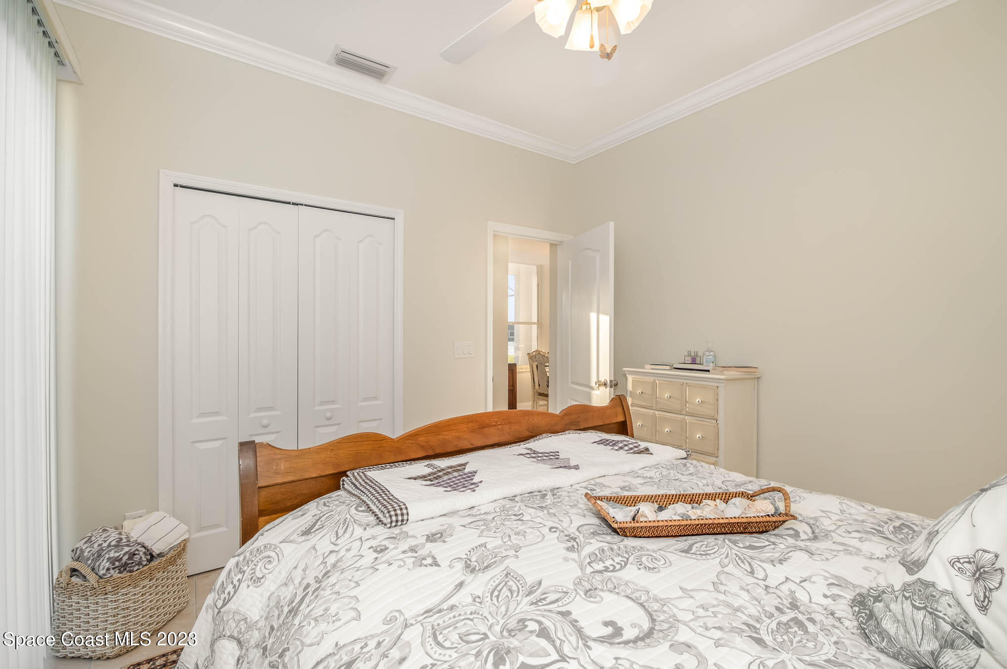 3032 Jacobaeus Lane Indialantic, FL 32903 - Photo 18 of 43 a bedroom with a bed and a table