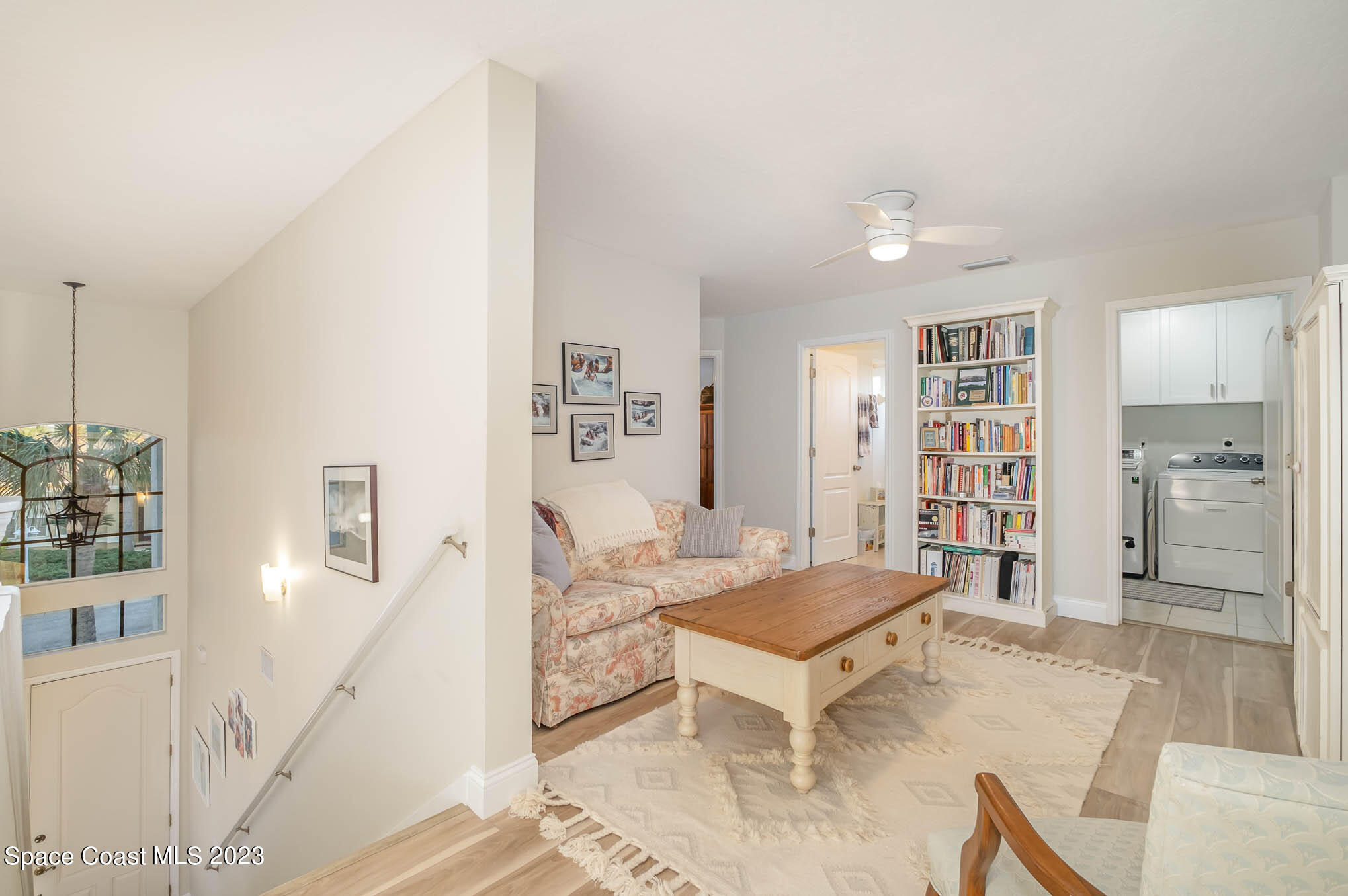 3032 Jacobaeus Lane Indialantic, FL 32903 - Photo 19 of 43 a living room with furniture and wooden floor
