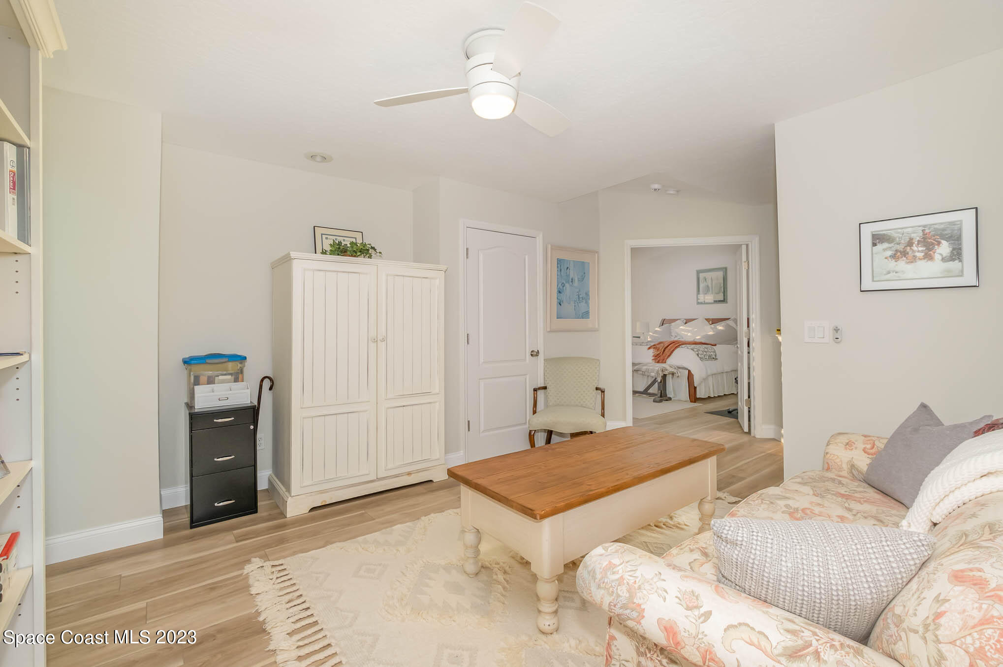 3032 Jacobaeus Lane Indialantic, FL 32903 - Photo 20 of 43 a living room with furniture and a table