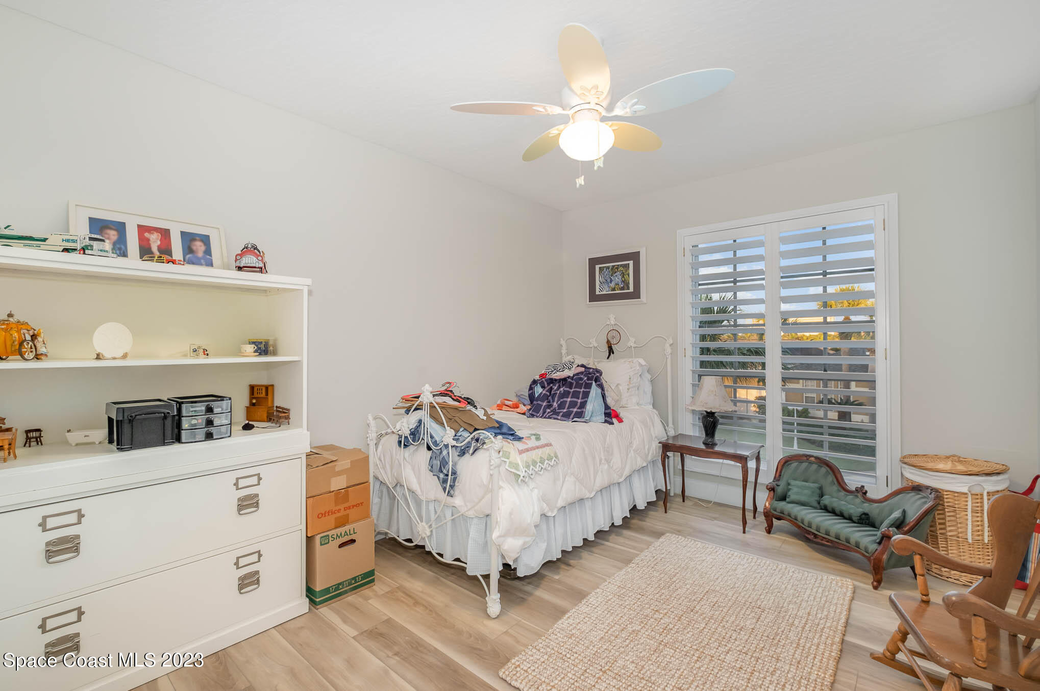 3032 Jacobaeus Lane Indialantic, FL 32903 - Photo 30 of 43 a bedroom with a bed and a window