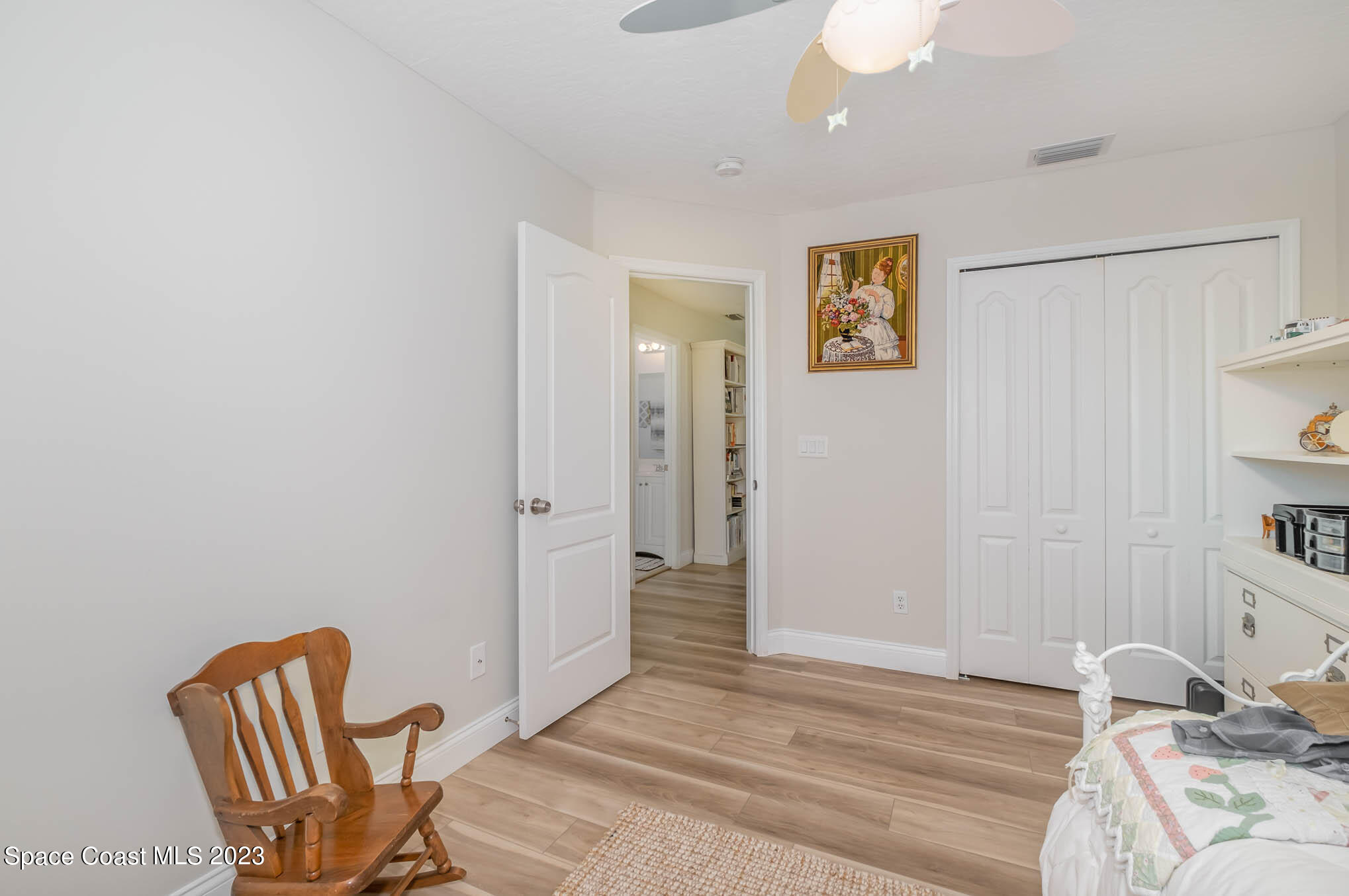 3032 Jacobaeus Lane Indialantic, FL 32903 - Photo 31 of 43 a bedroom with a bed and furniture