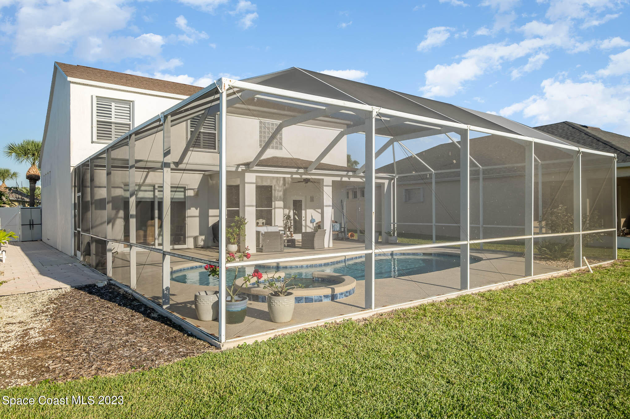 3032 Jacobaeus Lane Indialantic, FL 32903 - Photo 36 of 43 a view of a house with a yard and balcony