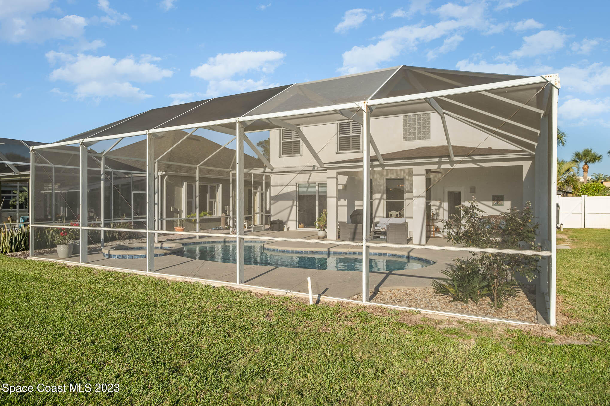 3032 Jacobaeus Lane Indialantic, FL 32903 - Photo 37 of 43 a view of a house with a backyard