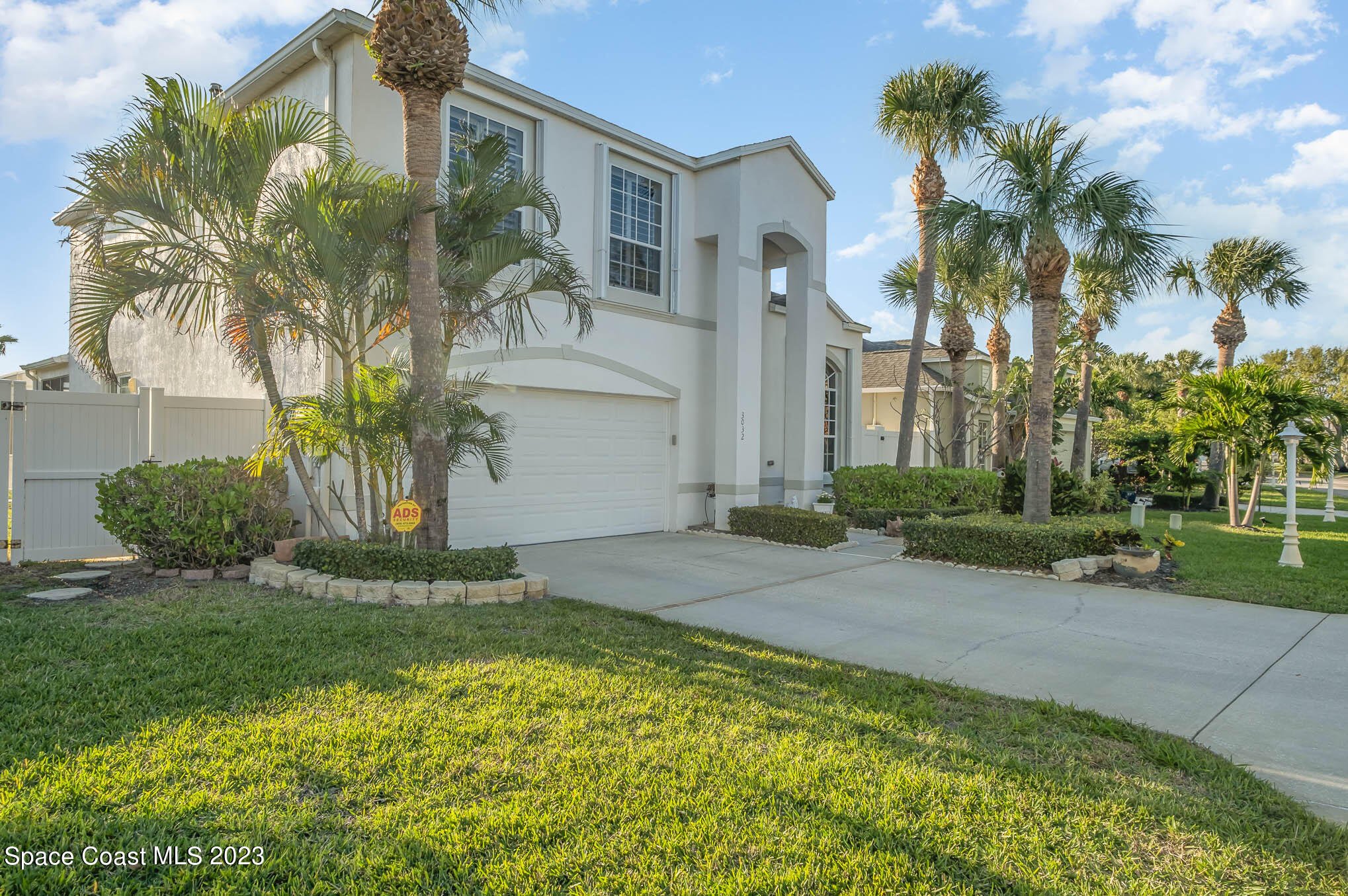 3032 Jacobaeus Lane Indialantic, FL 32903 - Photo 4 of 43 a front view of house with yard and green space